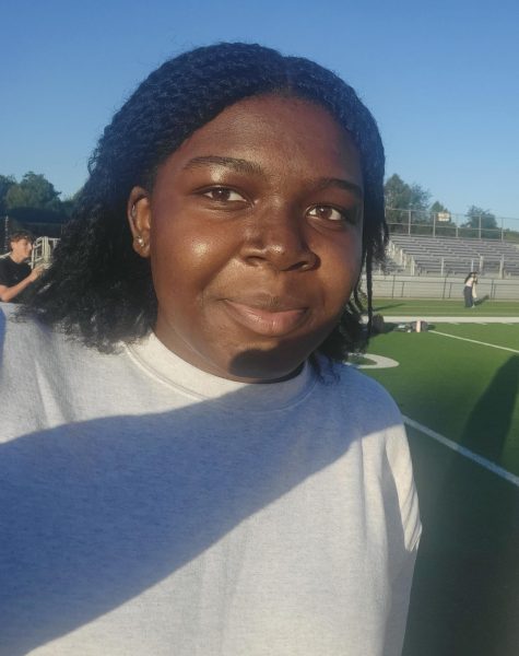 Senior Taiwo Balogun poses for a photo during the senior sunrise.
