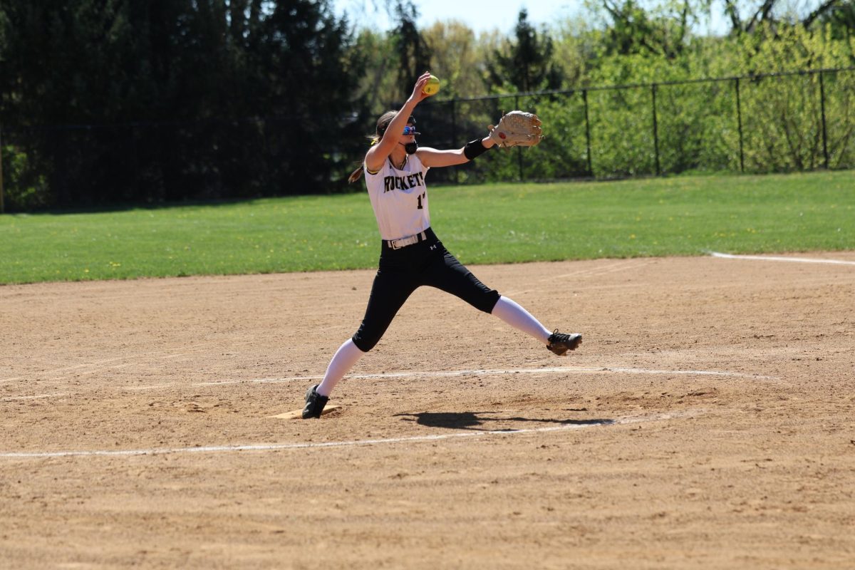 Junior Maddie Little loads up to deliver a pitch.