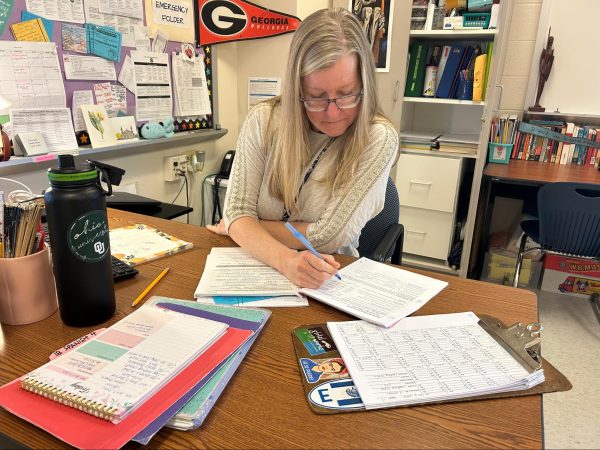 Spanish teacher Laura Hodge disavows most technology in her classes, instead preferring to use hard copies and face-to-face communication with her students.