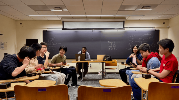 The RM varsity quiz bowl team competes against Poolesville in the final round at a nationals-qualifying tournament at Johns Hopkins University on April 4. 